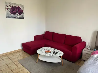 Coin salon dans l'établissement Chambre
