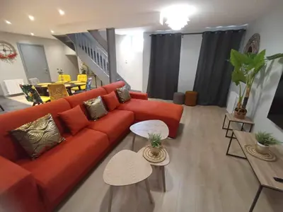 Coin salon dans l'établissement Le palais duplex