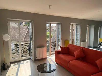 Coin salon dans l'établissement Le palais duplex