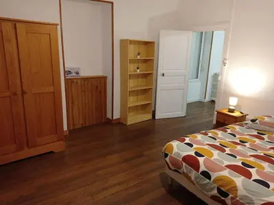Un ou plusieurs lits dans un hébergement de l'établissement Appartement centre Saulieu