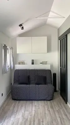 Coin salon dans l'établissement Petite maison dans la prairie