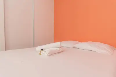 Un ou plusieurs lits dans un hébergement de l'établissement Magnifique logement spacieux hyper centre