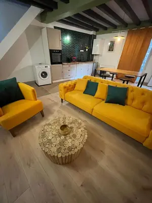 Cuisine ou kitchenette dans l'établissement appart hôtel le 8 LE DUPLEX