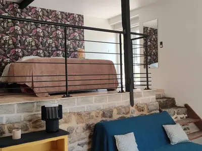 Coin salon dans l'établissement gîte dans ancien moulin
