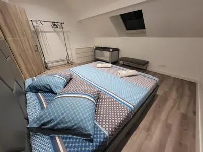 Un ou plusieurs lits dans un hébergement de l'établissement le duplex 4 personnes