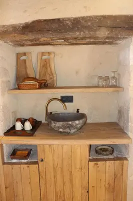 Cuisine ou kitchenette dans l'établissement Châteauneuf Suites