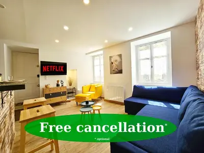 Télévision ou salle de divertissement dans l'établissement Rez de chaussée appartement à Tournus - Yellow
