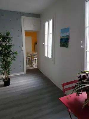 Coin salon dans l'établissement La place aux fleurs