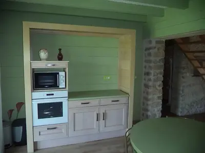 Cuisine ou kitchenette dans l'établissement Espace Famille Montmillon
