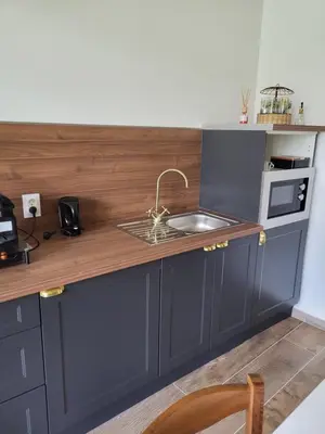 Cuisine ou kitchenette dans l'établissement Le Clos