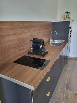 Cuisine ou kitchenette dans l'établissement Le Clos