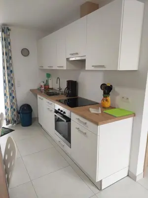 Cuisine ou kitchenette dans l'établissement L’Impasse