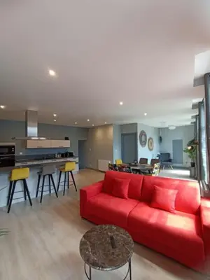 Coin salon dans l'établissement Appartement Le palais autun