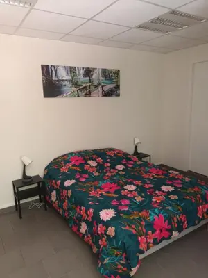 Un ou plusieurs lits dans un hébergement de l'établissement Gîte 4 personnes proche des cascades du Hérisson