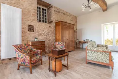 Coin salon dans l'établissement Le Grand Pressoir - Grande maison avec jardin