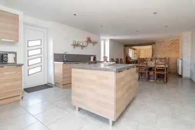 Cuisine ou kitchenette dans l'établissement Le Grand Pressoir - Grande maison avec jardin