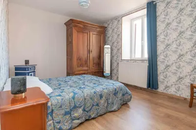 Un ou plusieurs lits dans un hébergement de l'établissement Le Grand Pressoir - Grande maison avec jardin