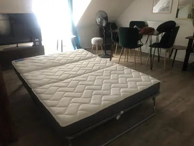 Un ou plusieurs lits dans un hébergement de l'établissement Appartement BELLO , ruelle au cœur de ville, arrivée en autonomie