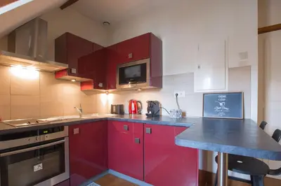 Cuisine ou kitchenette dans l'établissement La Tonnellerie