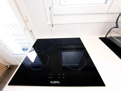 Cuisine ou kitchenette dans l'établissement Le Cosy Thurot : Proche Gare, Familial et Spacieux