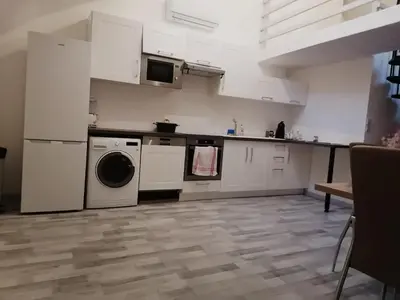 Cuisine ou kitchenette dans l'établissement La tour du bonheur
