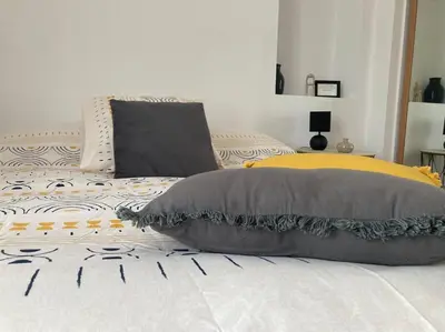 Un ou plusieurs lits dans un hébergement de l'établissement 38BIS Location nuit / week-end / vacances