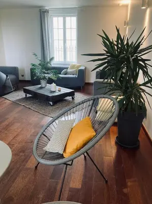 Coin salon dans l'établissement 38BIS Location nuit / week-end / vacances