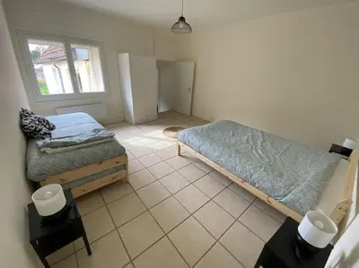 Un ou plusieurs lits dans un hébergement de l'établissement Maison à Pouilly en Auxois