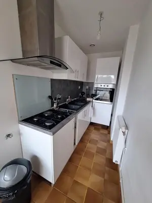 Cuisine ou kitchenette dans l'établissement Le-bon-appart de plain-pied avec terrasse