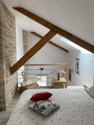 Un ou plusieurs lits dans un hébergement de l'établissement Gite La So Sweet