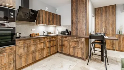 Cuisine ou kitchenette dans l'établissement Aux Fleurs de Darcy Confort Centre Ville