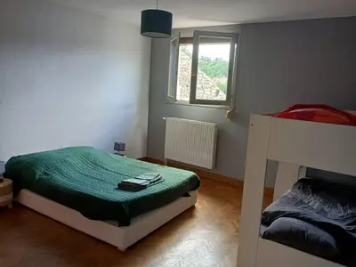 Un ou plusieurs lits dans un hébergement de l'établissement Pont-de-poitte: Appart'Alice