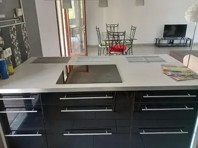 Cuisine ou kitchenette dans l'établissement Pont-de-poitte: Appart'Alice