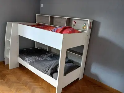 Un ou plusieurs lits dans un hébergement de l'établissement Pont-de-poitte: Appart'Alice