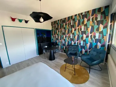 Un ou plusieurs lits dans un hébergement de l'établissement Studio centre-ville