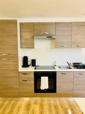 Cuisine ou kitchenette dans l'établissement L'Escapade à Coligny