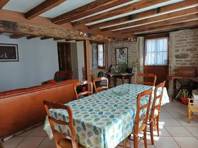 Coin salon dans l'établissement L'authentique Maison cœur de Ladoix-Serrigny