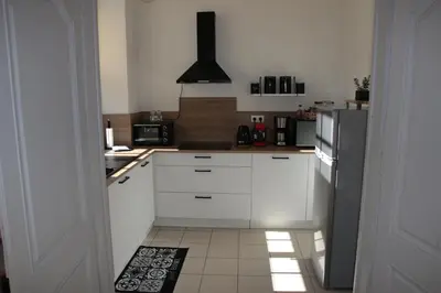 Cuisine ou kitchenette dans l'établissement Le Prieuré