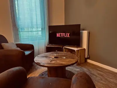 Télévision ou salle de divertissement dans l'établissement Vinea urbana