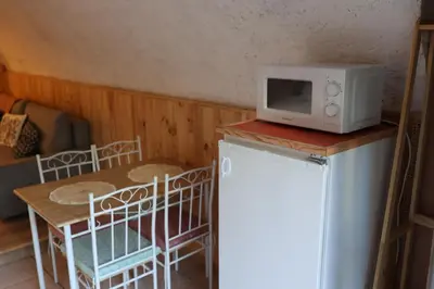 Cuisine ou kitchenette dans l'établissement Studio des mésanges