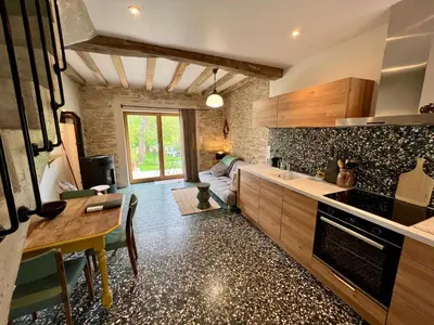 Cuisine ou kitchenette dans l'établissement La Petite Maison
