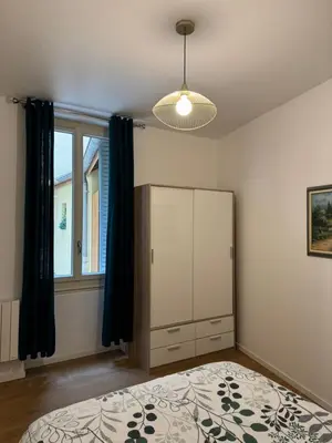 Un ou plusieurs lits dans un hébergement de l'établissement Appartement meublé tout confort