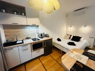 Cuisine ou kitchenette dans l'établissement Le Carnot - Hospices - Centre - Climatisation