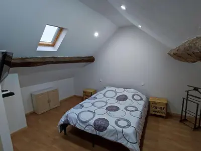 Un ou plusieurs lits dans un hébergement de l'établissement La maison de vos vacances