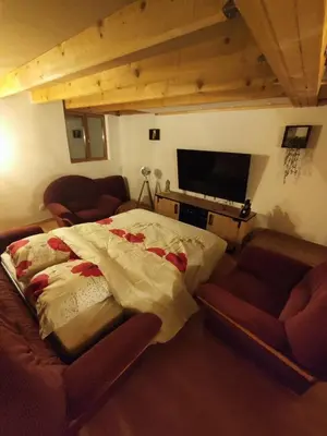 Coin salon dans l'établissement La maison de vos vacances
