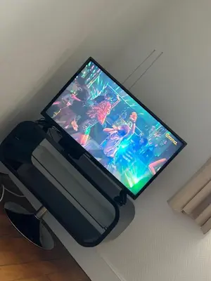 Télévision ou salle de divertissement dans l'établissement Studio