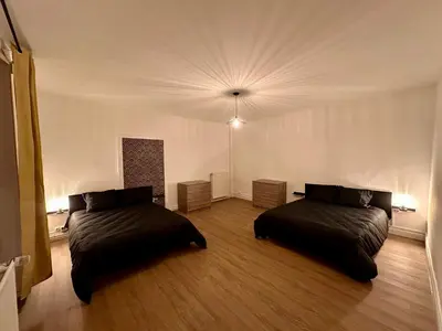 Un ou plusieurs lits dans un hébergement de l'établissement L'Atelier loft