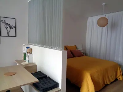 Un ou plusieurs lits dans un hébergement de l'établissement Appartement Hestia F1 bis + terrasse hyper centre