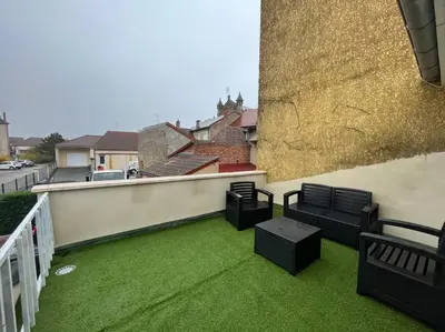 Coin salon dans l'établissement Duplex belle pierre