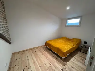 Un ou plusieurs lits dans un hébergement de l'établissement Duplex belle pierre